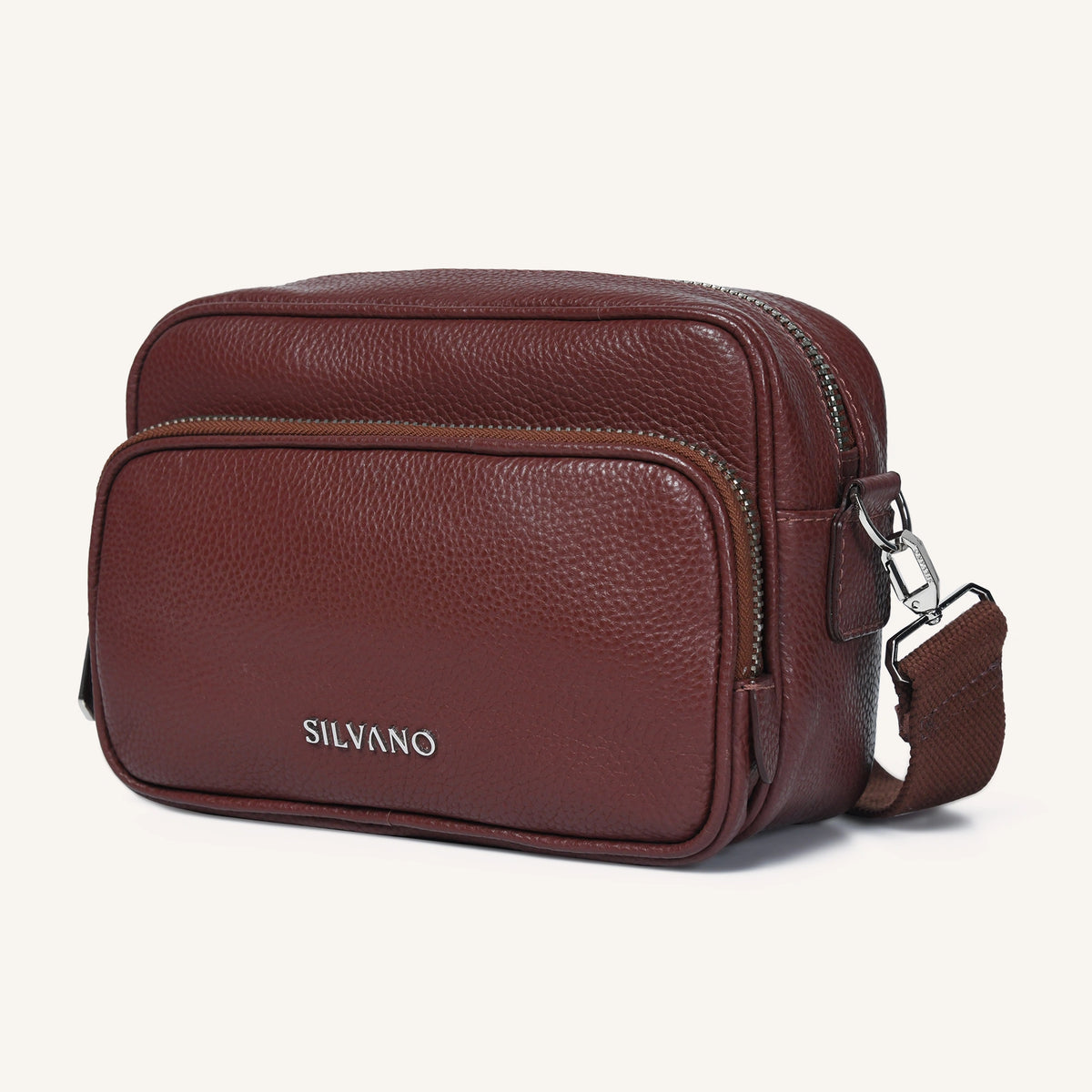 Brown leather bag with 'Silvano' branding on a white background