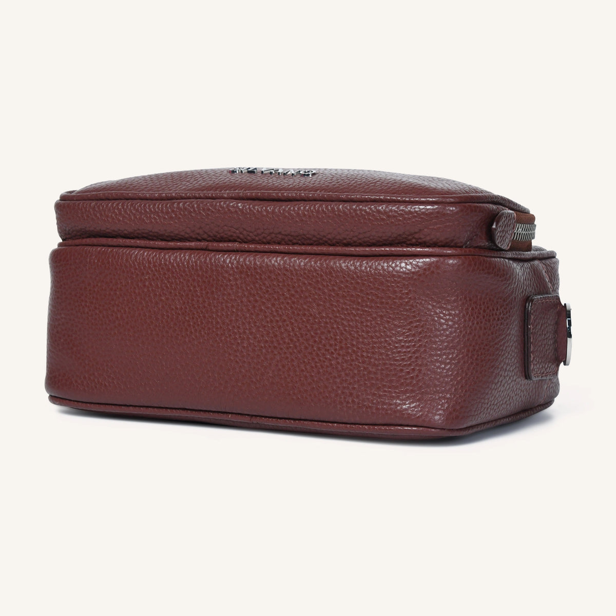 Brown leather bag on a white background