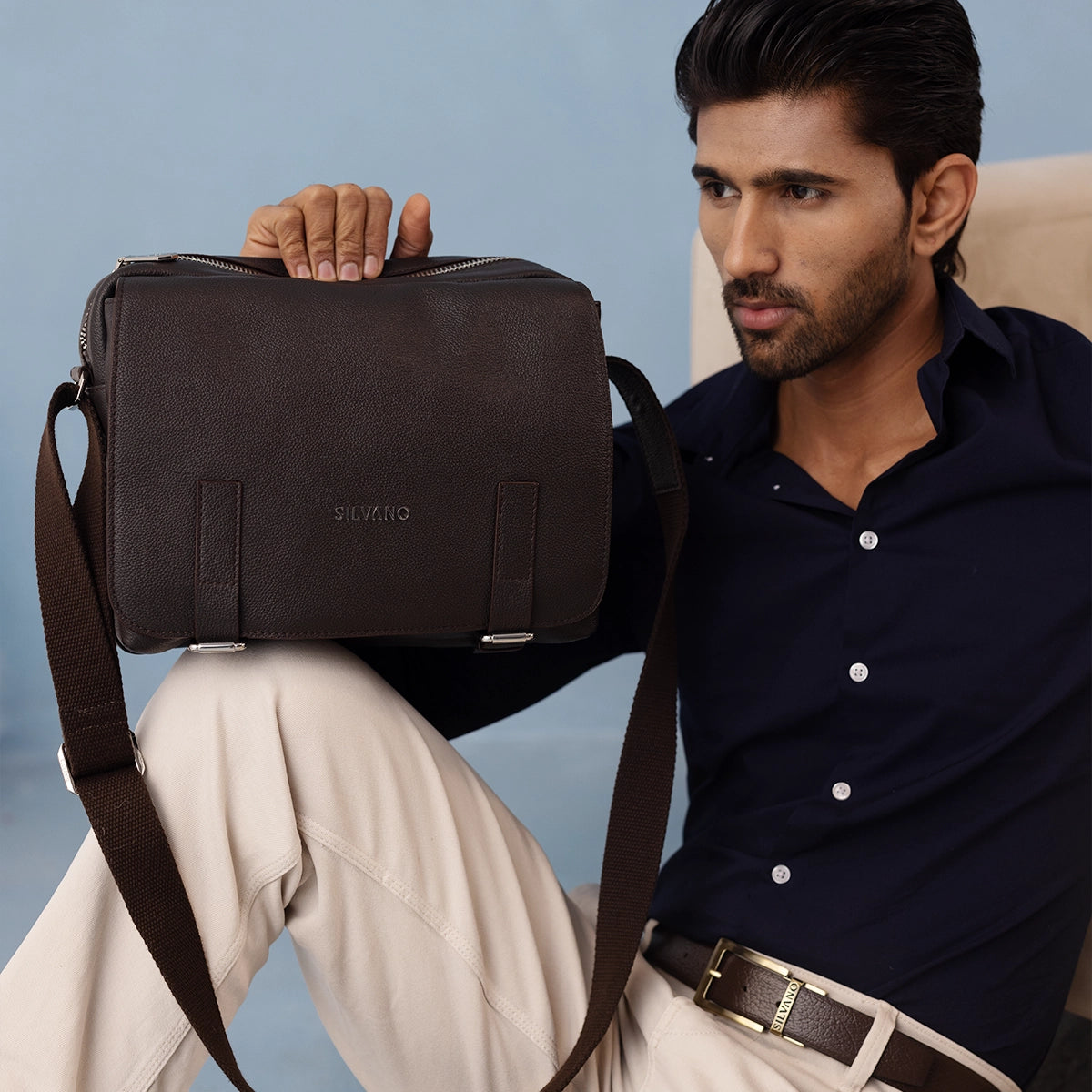man with silvano wander flap messenger bag - dark brown leather messenger bag