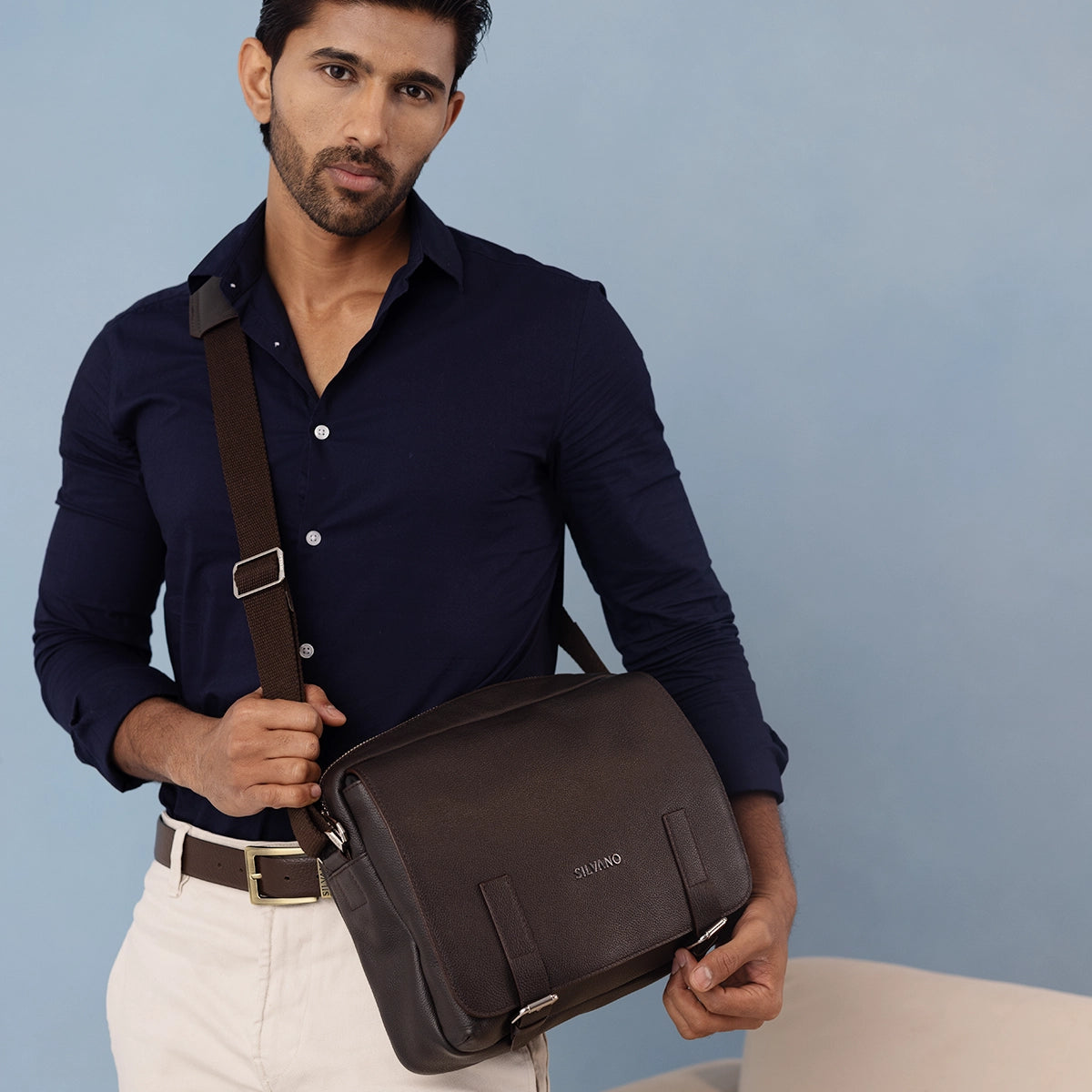 man with silvano wander flap messenger bag - dark brown leather messenger bag